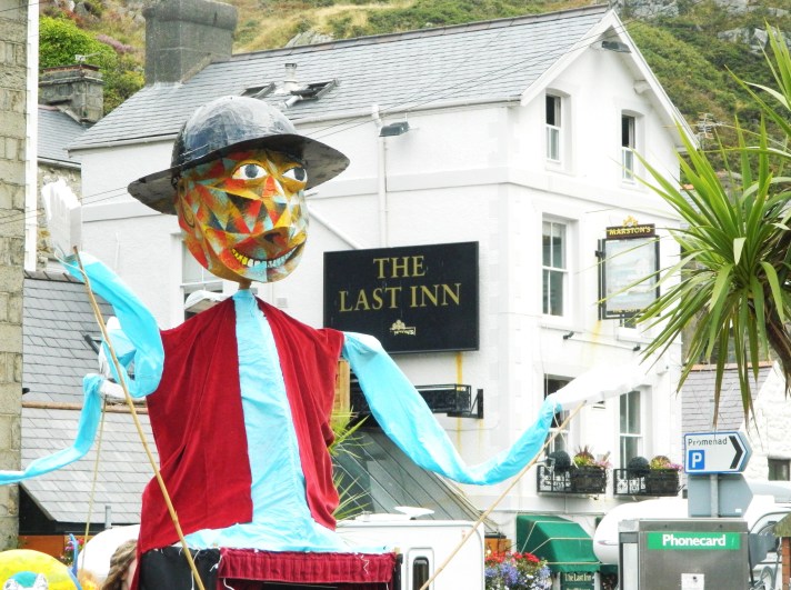 Giant puppet in front of Last Inn Barmouth